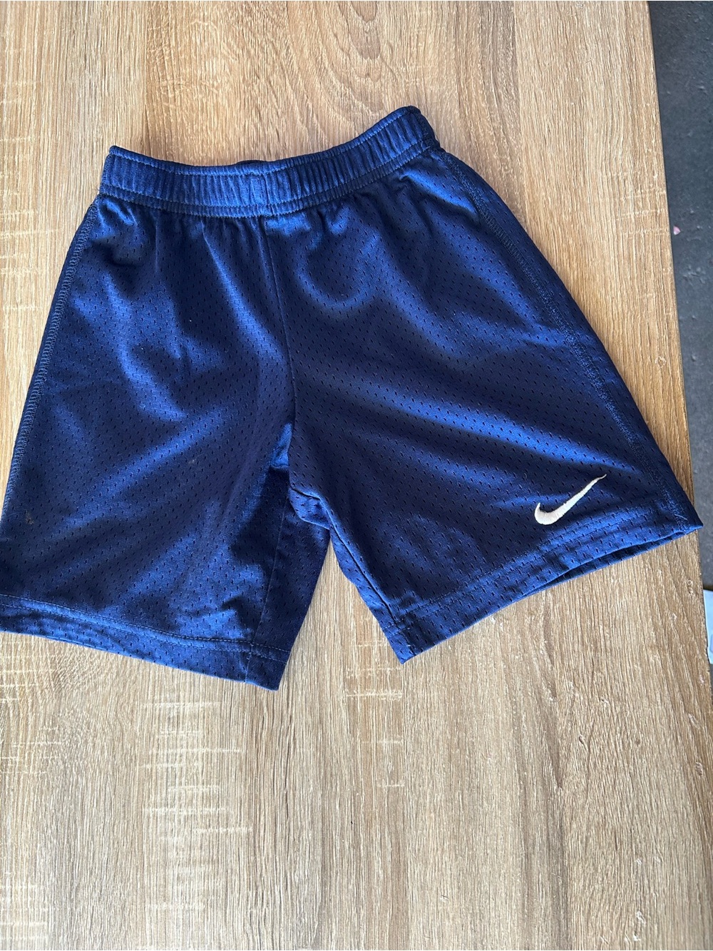 Nike Navy Blue Mesh Athletic Shorts with White Swoosh